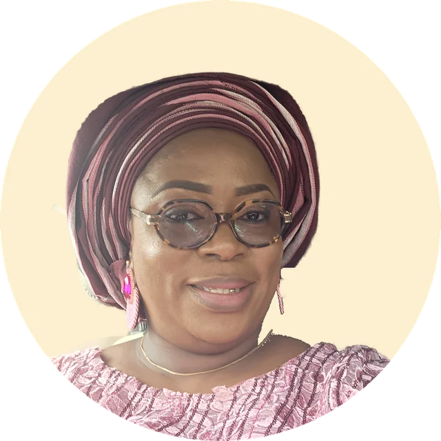 Portrait of Oluwakemi Kemi Asekun in a pink gele and lace